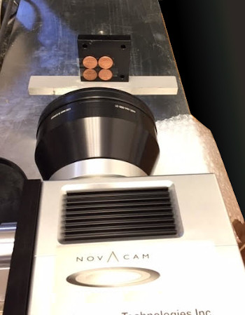 The NOVACAM SURFACEINSPECT system with a 54x54 FOV easily scans 4 pennies in one go.